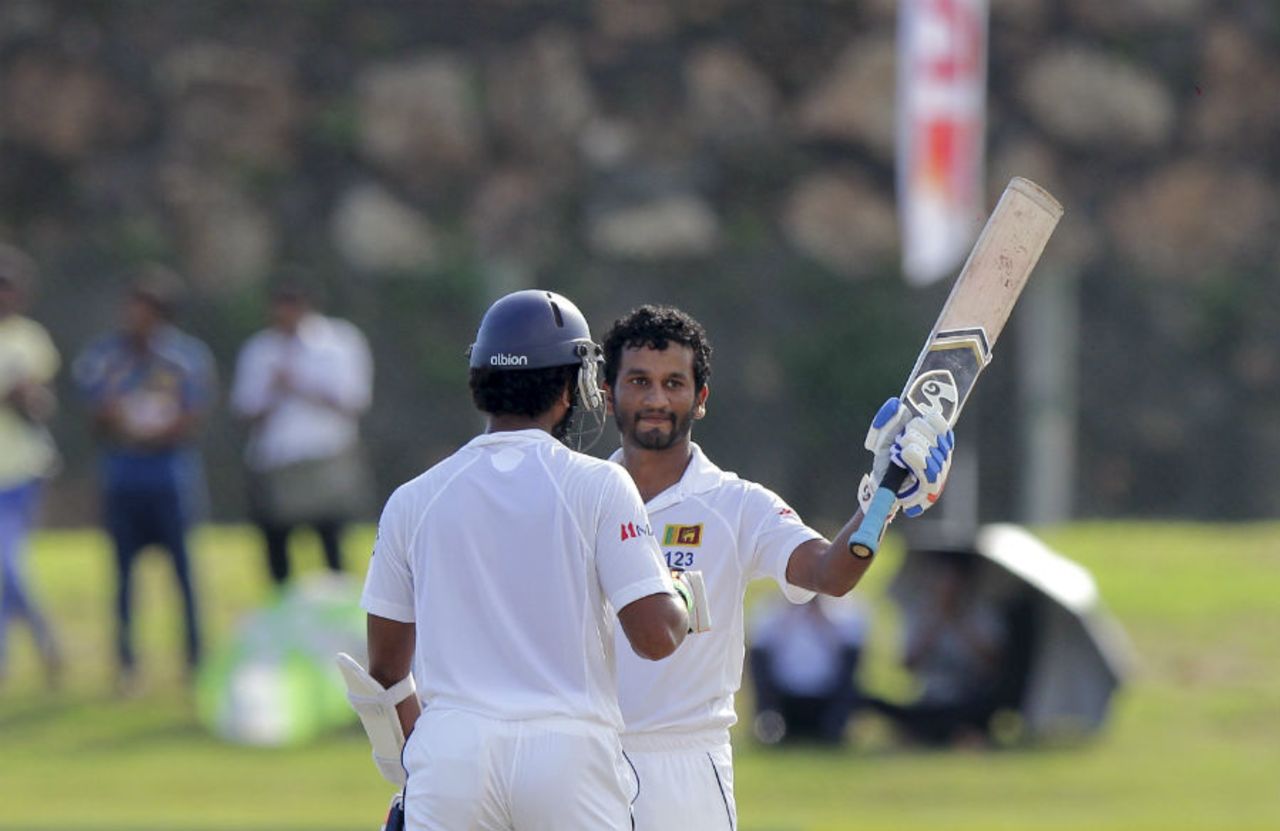 Dimuth Karunaratne raises the bat after making hundred, Sri Lanka v West Indies, 1st Test, Galle, 1st day, October 14, 2015