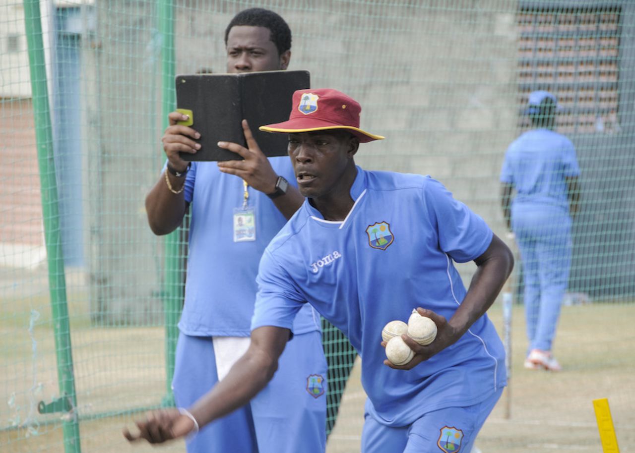 West Indies Women coach Vasbert Drakes gives throwdowns in the nets, St Lucia, October 14, 2015