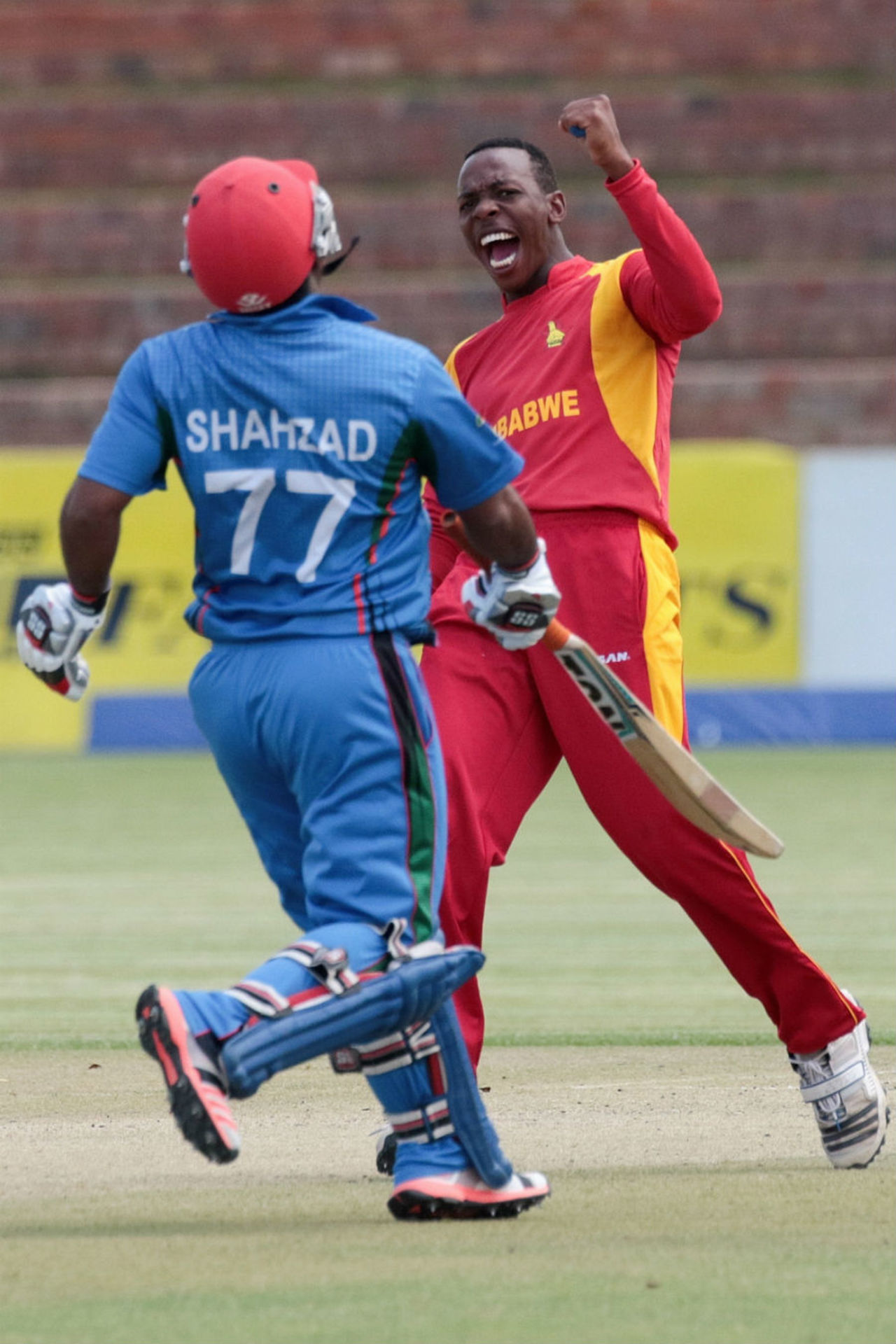 Wellington Masakadza celebrates after dismissing Mohammad Shahzad, Zimbabwe v Afghanistan, 1st ODI, Bulawayo, October 16, 2015