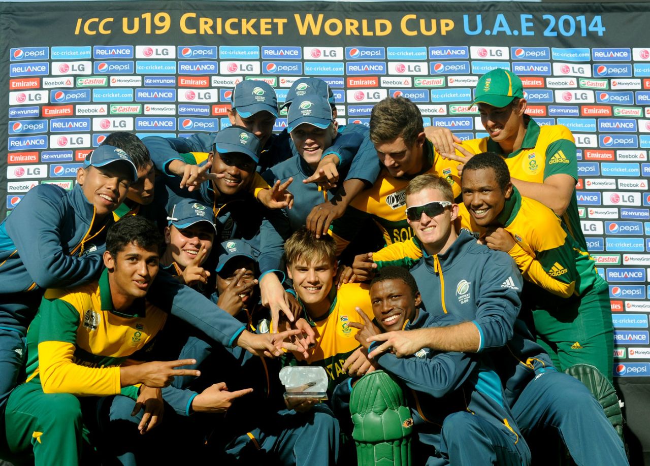 The South Africa players lift the World Cup trophy, Pakistan v South Africa, Final, Under-19 World Cup, Dubai, March 1, 2014