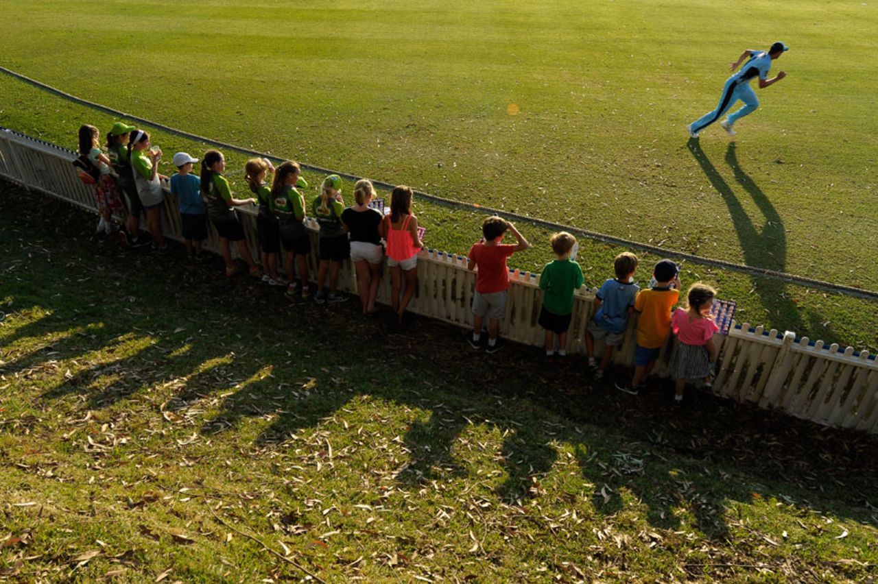 Young fans wait near the boundary for players' autographs, New South Wales v Queensland, Matador Cup, Drummoyne Oval, Sydney, October 16, 2015