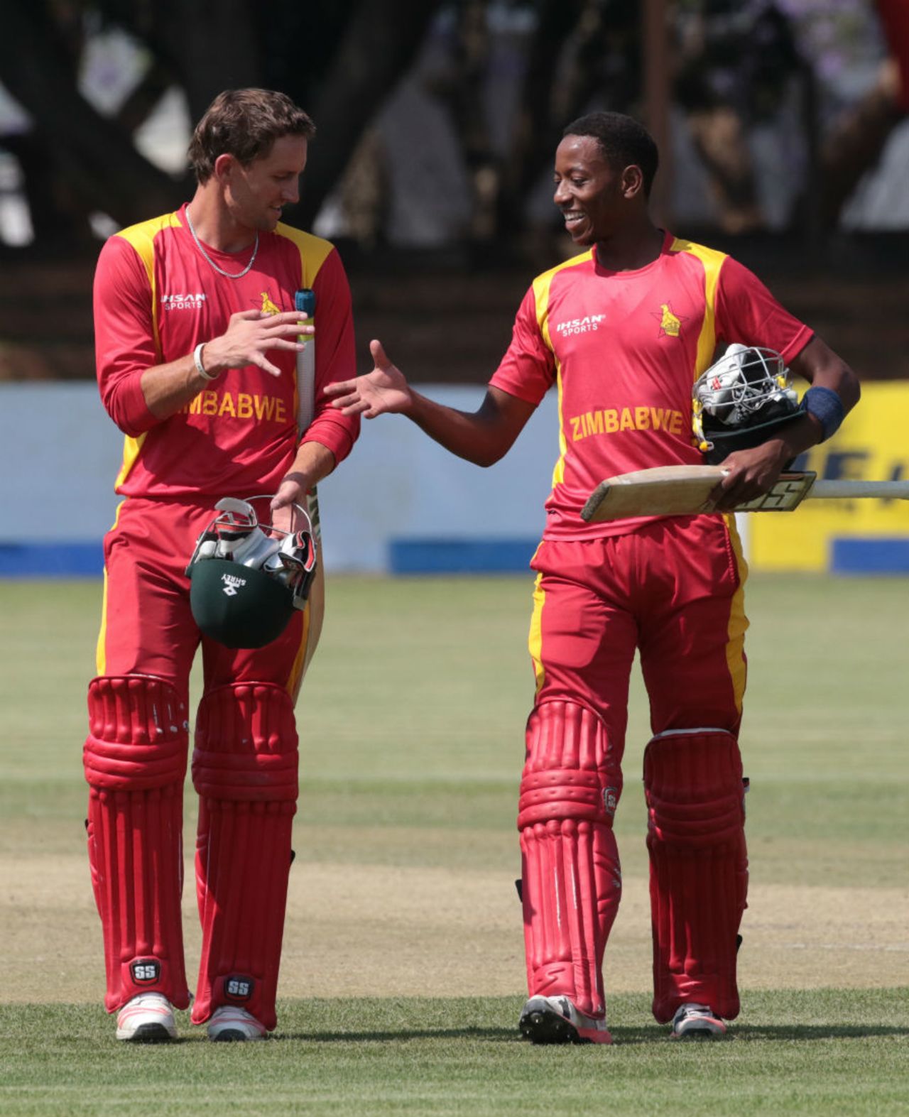 Craig Ervine and Tinotenda Mutumbodzi walk off after securing the eight-wicket win, Zimbabwe v Afghanistan, 1st ODI, Bulawayo, October 16, 2015