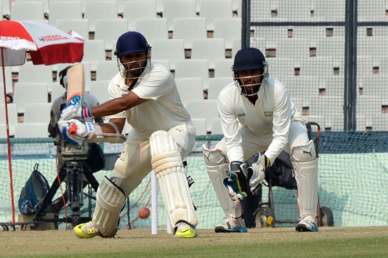 Parthiv Patel winds up for a big hit on his way to a century, Punjab v Gujarat, Ranji Trophy 2015-16, Group B, 2nd day, Mohali, October 16, 2015