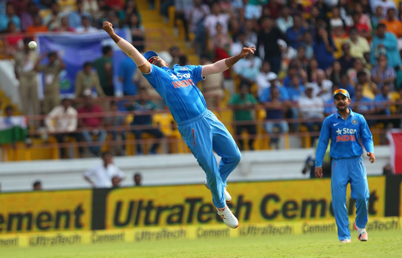Suresh Raina dives for a catch off Faf du Plessis, India v South Africa, 3rd ODI, Rajkot, October 18, 2015
