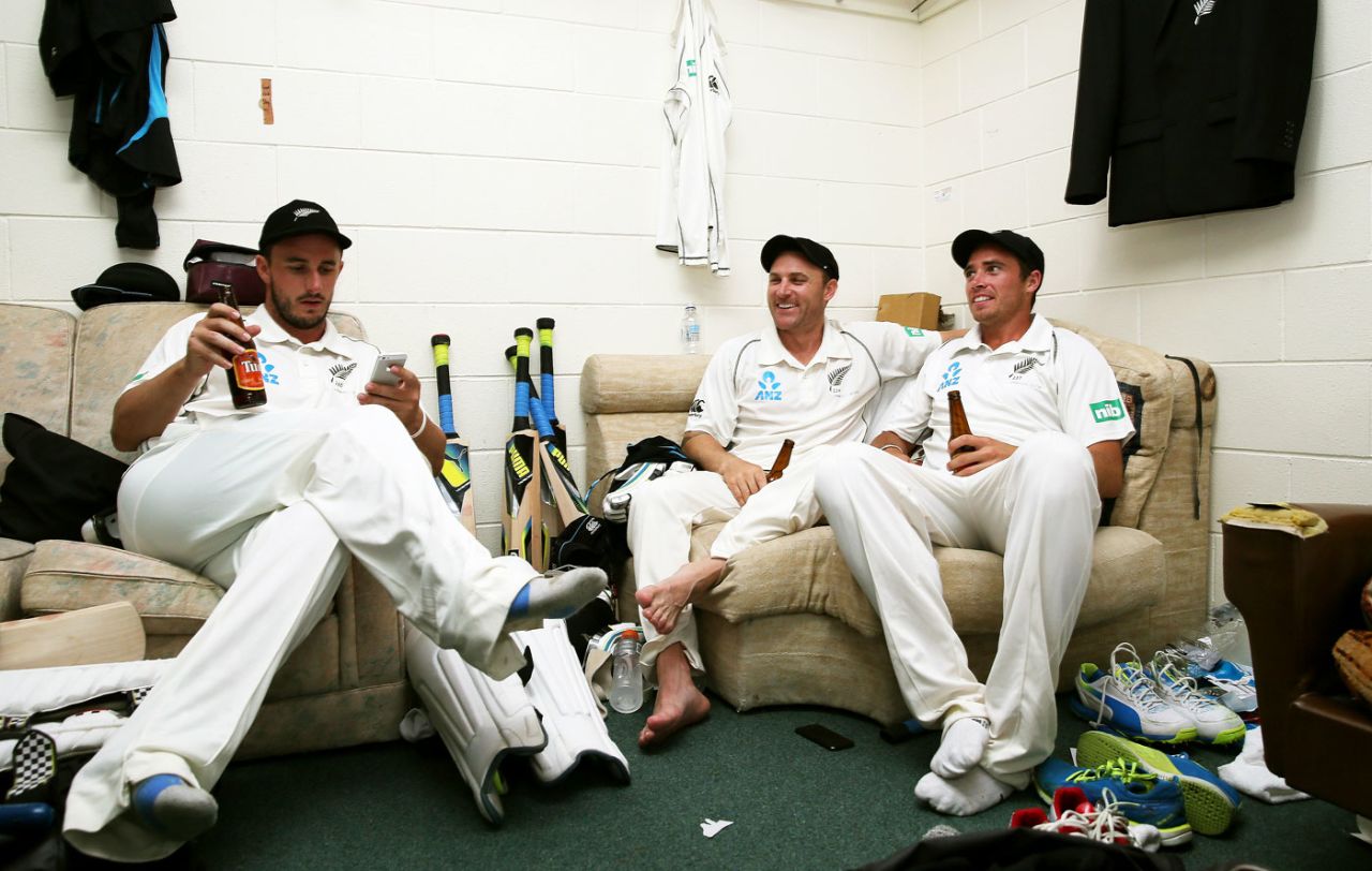 Hamish Rutherford, Brendon McCullum and Tim Southee relax in the dressing room after the win, New Zealand v West Indies, 3rd Test, Hamilton, 4th day, December 22, 2013