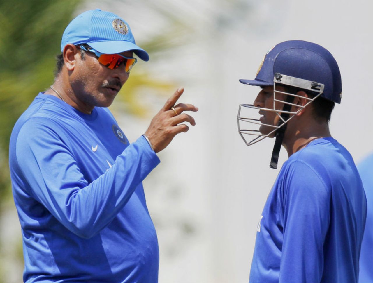 Ravi Shastri and MS Dhoni chat during a training session, Chennai, October 21, 2015