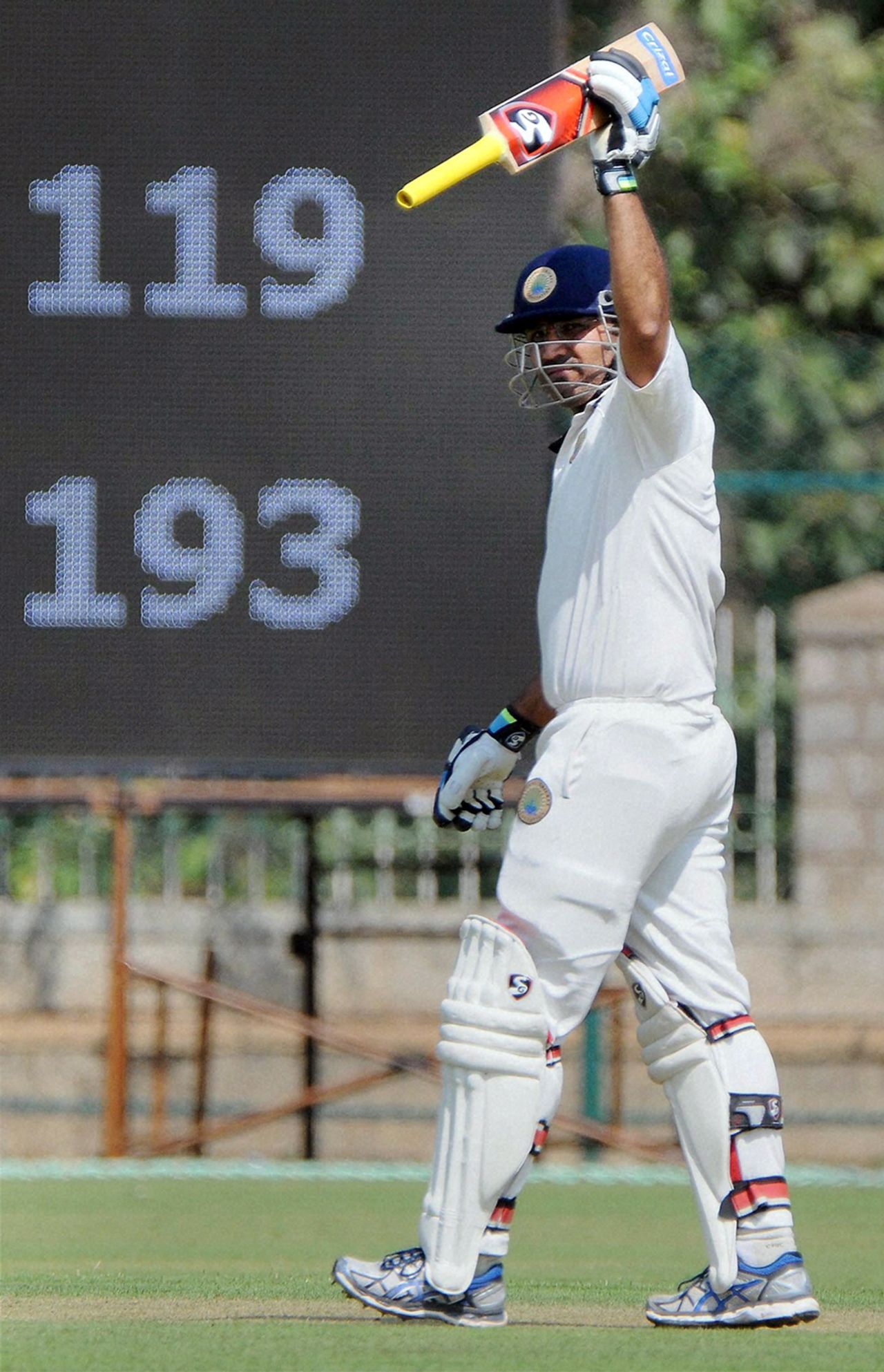 Virender Sehwag raises his bat after scoring a century against Karnataka, Karnataka v Haryana, Ranji Trophy 2015-16, Group A, Mysore, 1st day, October 22, 2015