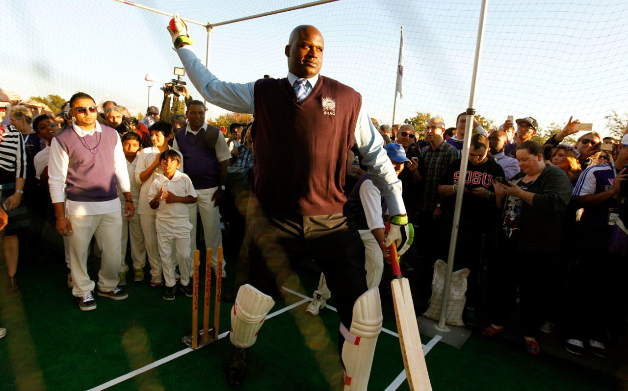 Shaquille O'Neal plays cricket during a promotional event in Sacramento, October 30, 2013