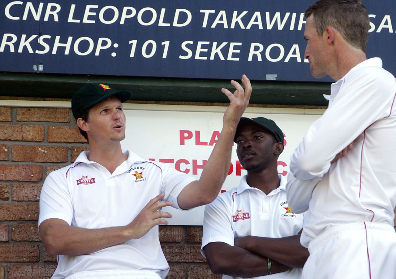 Mark Vermeulen talks to team-mates ahead of his Test return, Harare, August 9, 2014