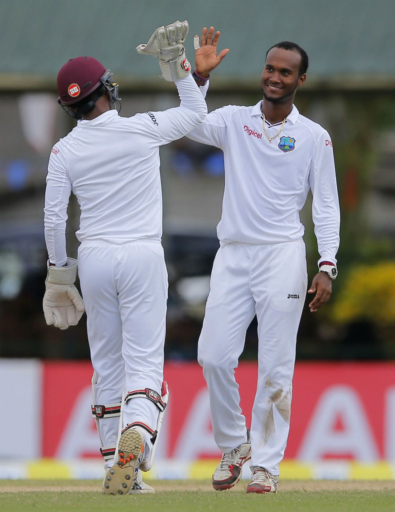 Kraigg Brathwaite gets a high-five from Denesh Ramdin, Sri Lanka v West Indies, 2nd Test, Colombo, 3rd day, October 24, 2015