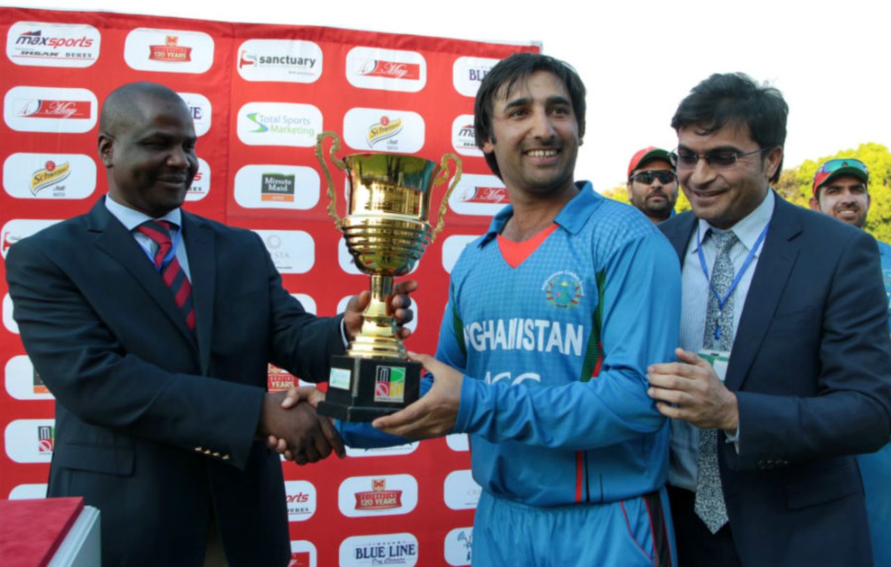 Asghar Stanikzai is handed the series trophy, Zimbabwe v Afghanistan, 5th ODI, Bulawayo, October 24, 2015