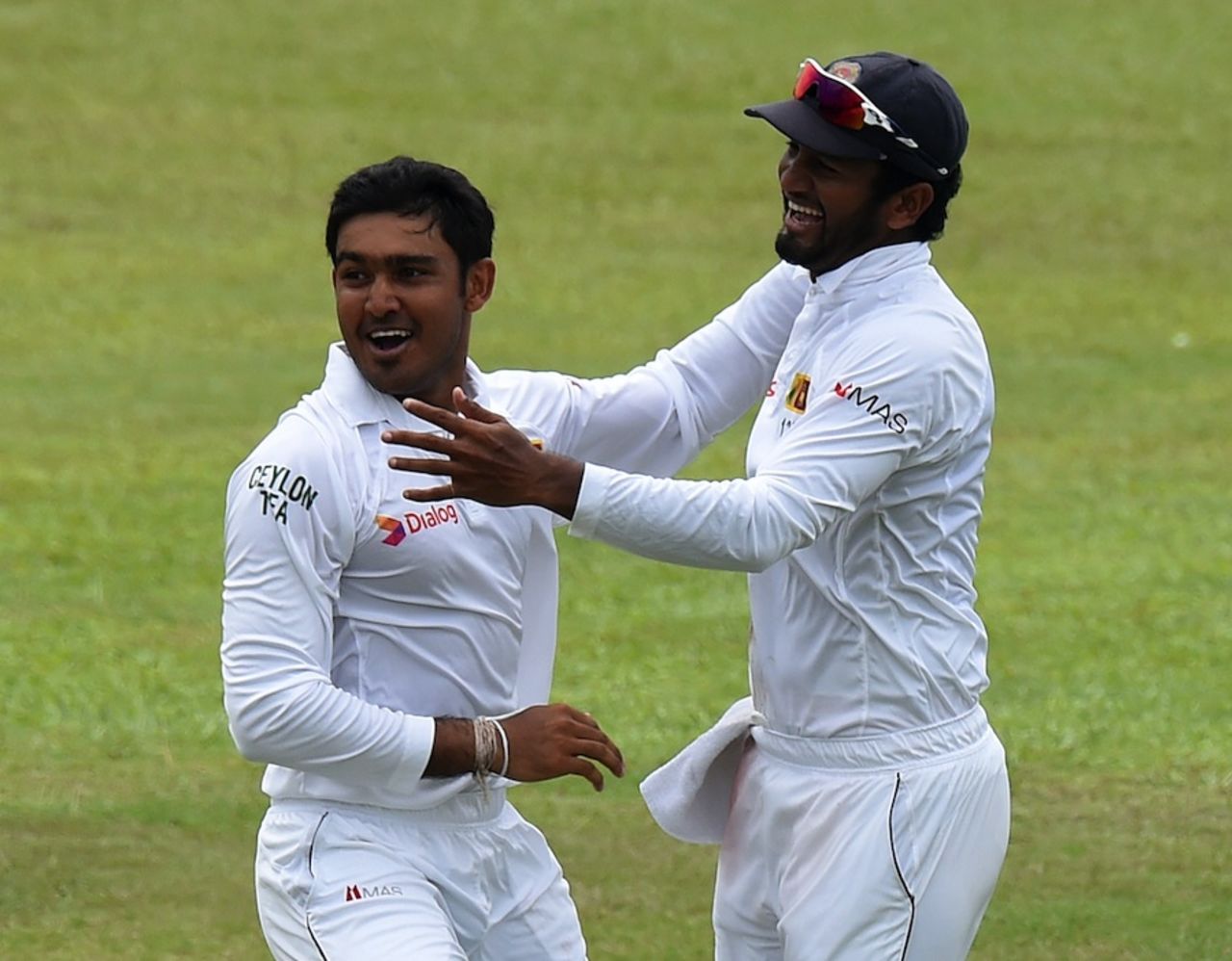 Milinda Siriwardana and Dimuth Karunaratne celebrate a wicket, Sri Lanka v West Indies, 2nd Test, P Sara Oval, Colombo, 5th day, October 26, 2015