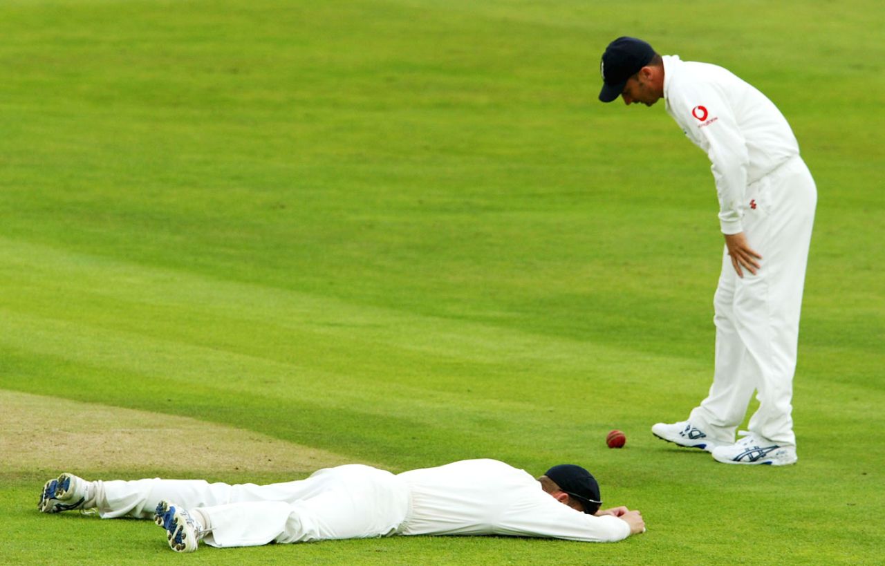 John Crawley buries his head in the grass after dropping a catch off Parthiv Patel, England v India, 3rd Test, Headingley, 3rd day, August 24, 2002