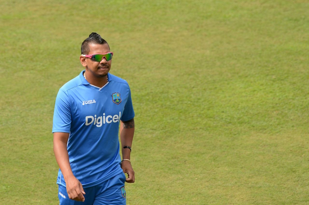 Sunil Narine walks on the outfield after rain delayed the start of the ODI in Colombo, Sri Lanka v West Indies, 1st ODI, Colombo, November 1, 2015