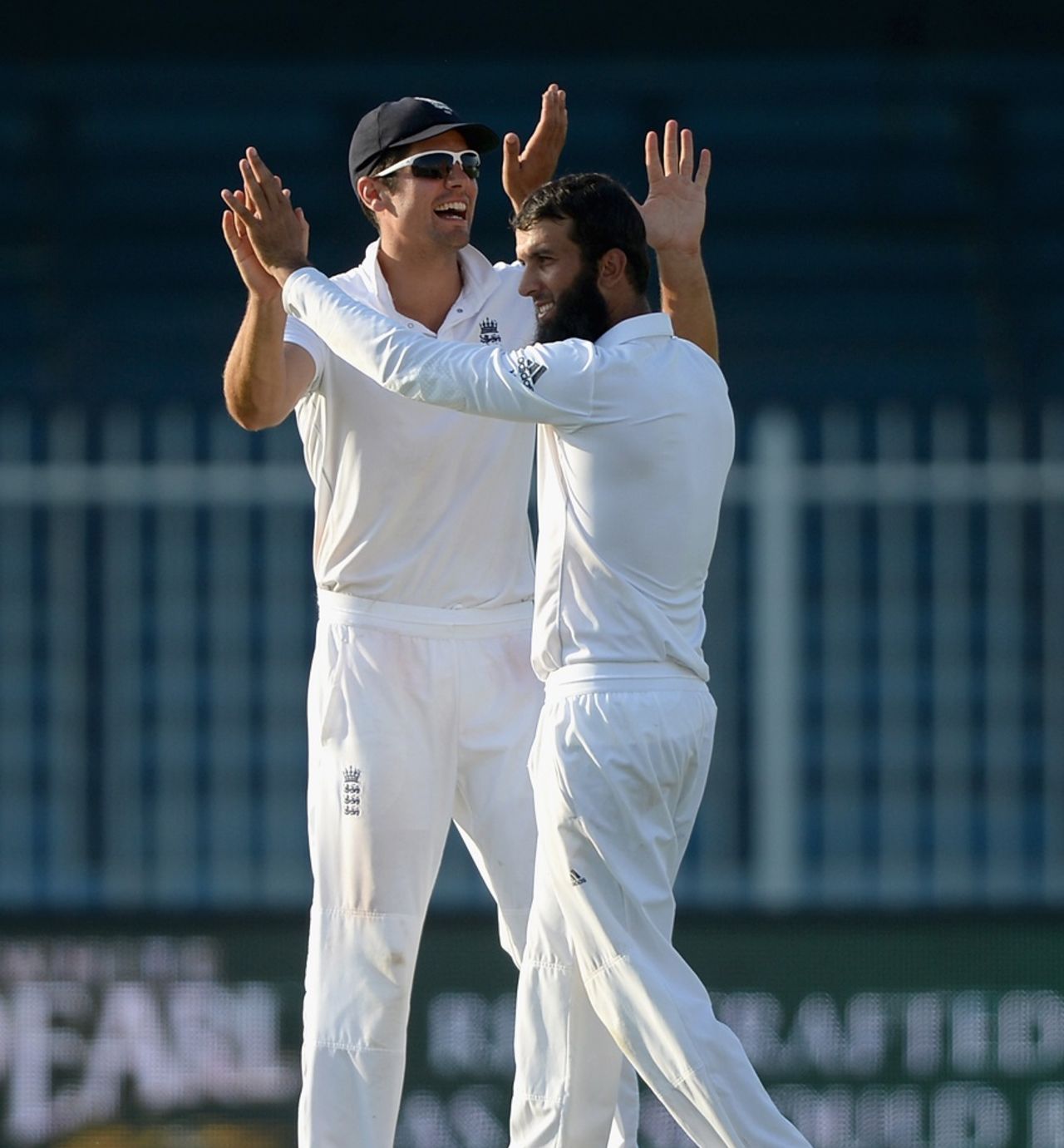 Moeen Ali takes a high-five from Alastair Cook,  Pakistan v England, third Test, Sharjah, 1st day, November 1, 2015