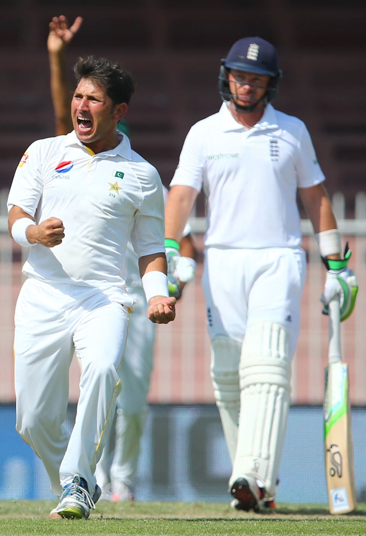 Ian Bell looks on as Yasir Shah removes Alastair Cook for 49, Pakistan v England, 3rd Test, Sharjah, 2nd day, November 2, 2015