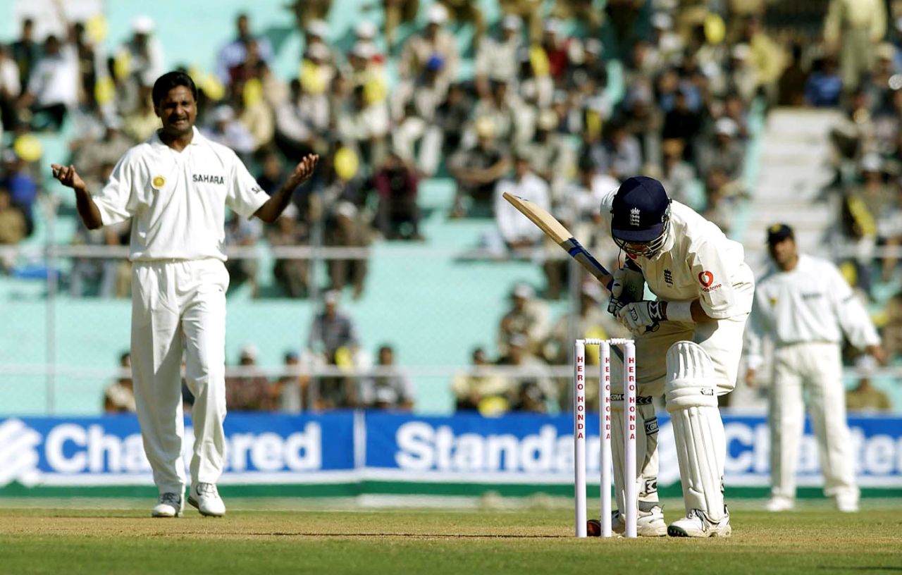 Javagal Srinath looks on as Craig White tries to prevent the ball from hitting the stumps, India v England, 2nd Test, Ahmedabad, 1st day, December 11, 2001