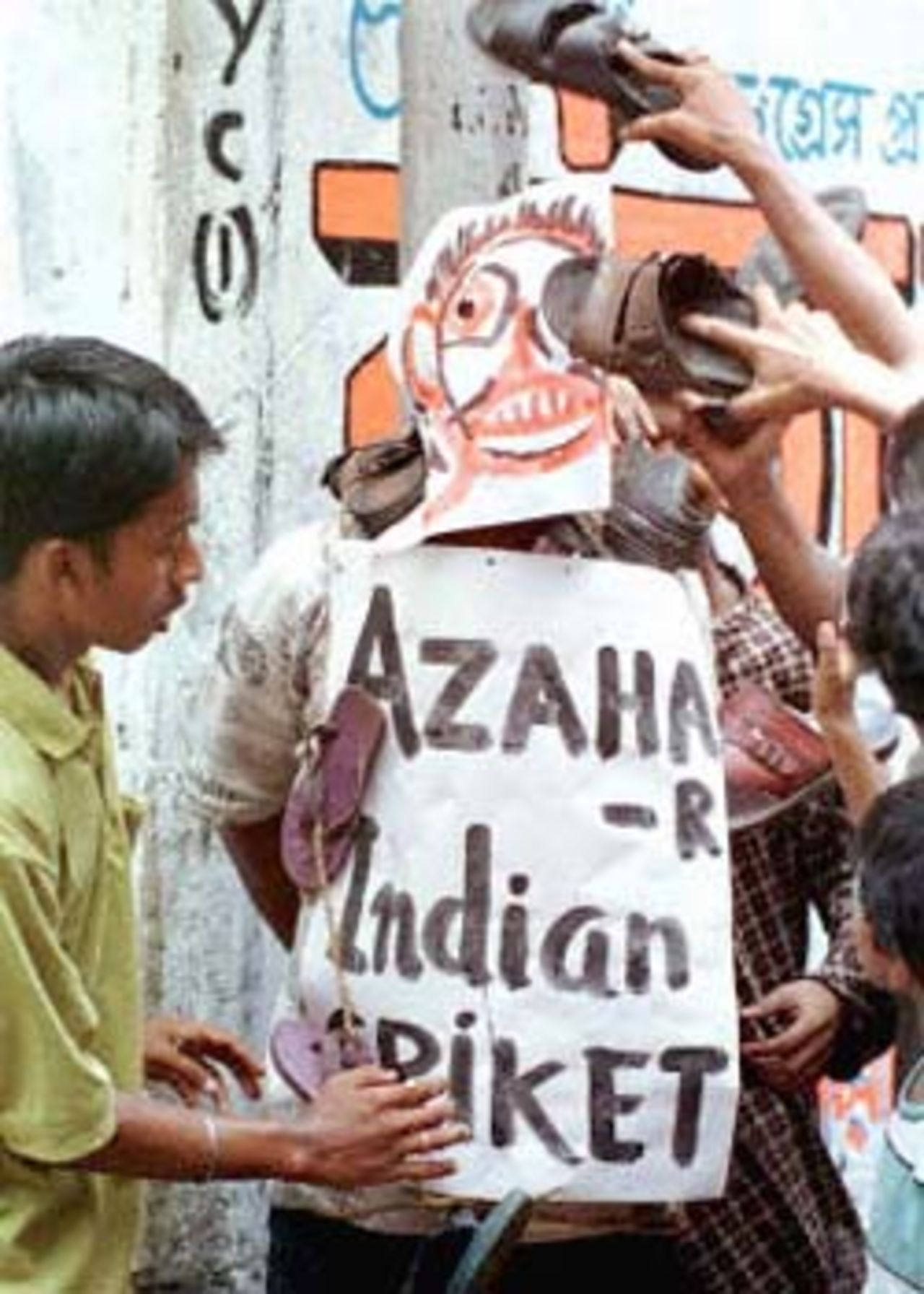 Indian cricket enthusiasts beat a likeness of former captain Mohammad Azharuddin during a demonstration 16 June 2000 following allegations of match fixing leveled against him by disgraced South African cricket captain Hansie Cronje. Azharuddin has denied any