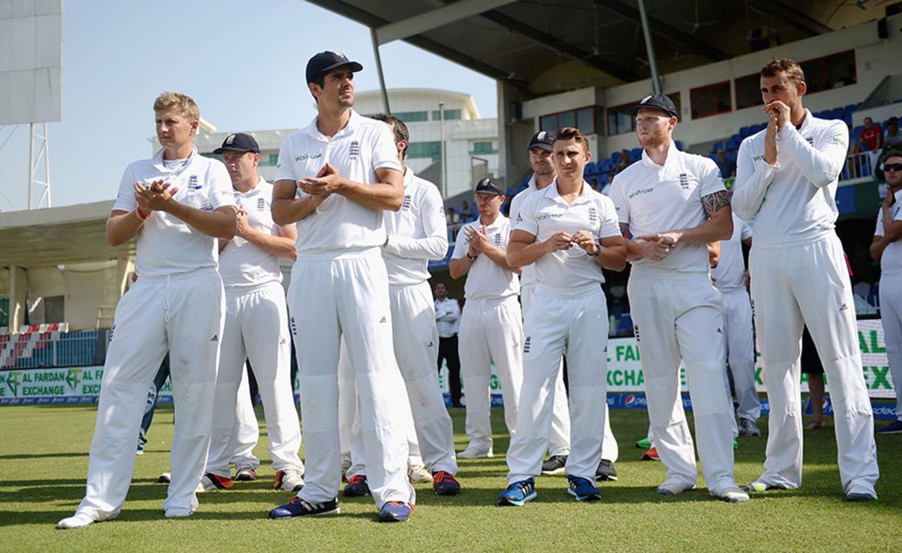 Alastair Cook and his beaten England team watch the presentation ceremony in Sharjah, Pakistan v England, 3rd Test, Sharjah, 5th day, November 5, 2015
