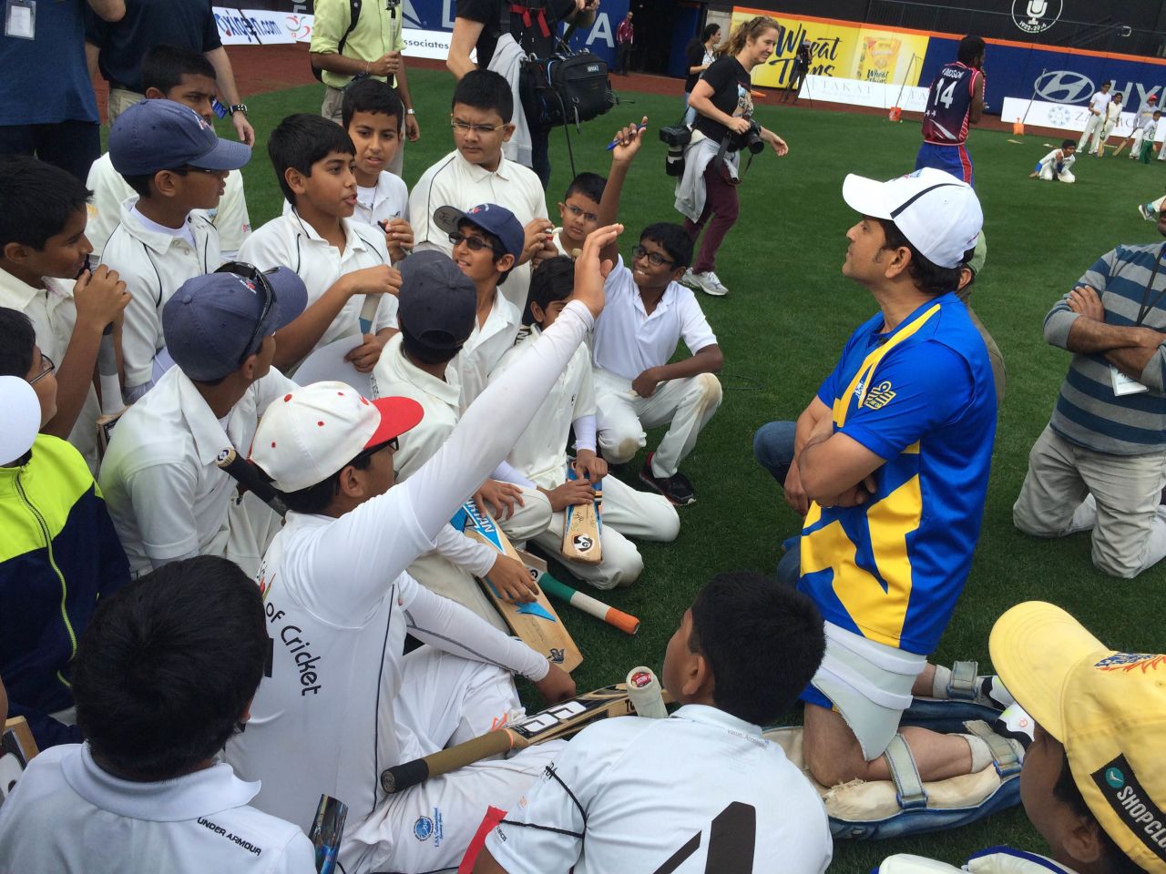 Sachin Tendulkar passes along tips to young cricketers during a clinic at Citi Field, Cricket All-Stars, Queens, New York, November 6, 2015