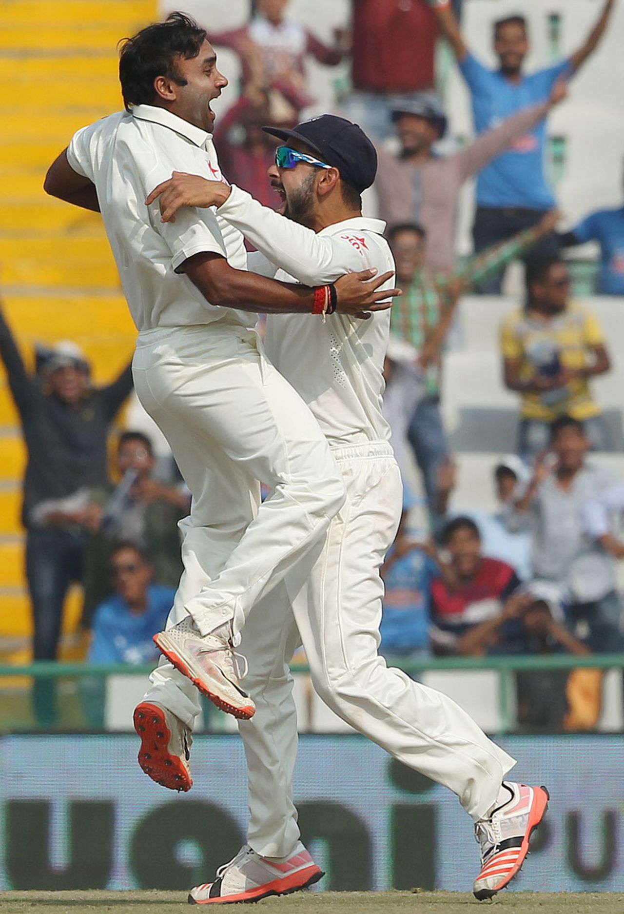 Amit Mishra and Virat Kohli are ecstatic after the wicket of AB de Villiers, India v South Africa, 1st Test, Mohali, 3rd day, November 7, 2015