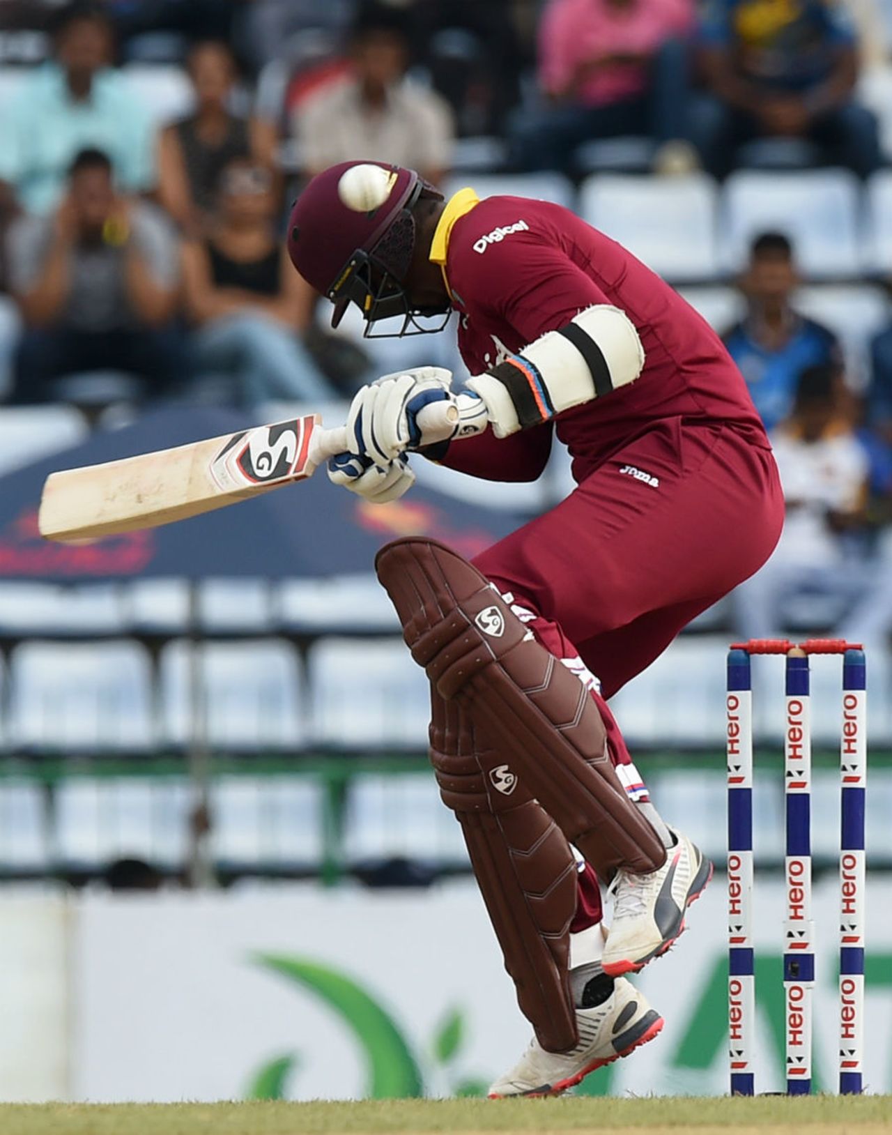 Marlons Samuels ducks a bouncer during his rearguard innings, Sri Lanka v West Indies, 3rd ODI, Pallekele, November 7, 2015
