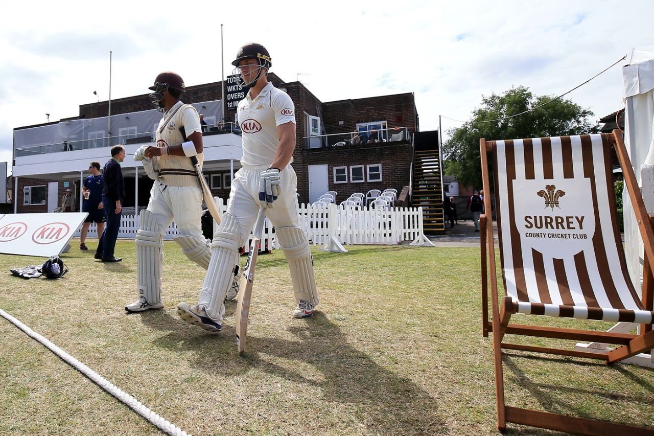Arun Harinath (left) and Zafar Ansari walk out to bat, Surrey v Glamorgan, Guildford, July 15, 2015