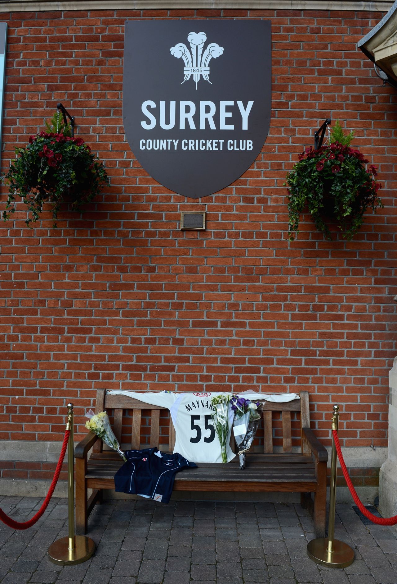 A bench displays tributes to Tom Maynard, The Oval, June 19, 2012
