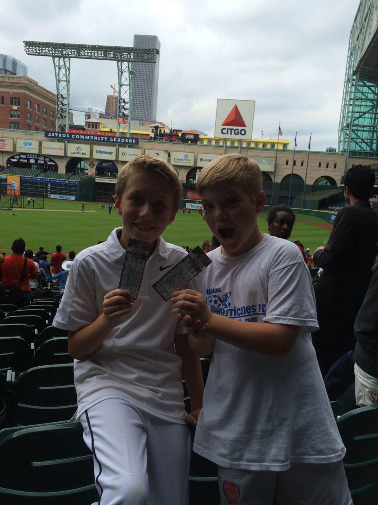 Jude Nesom and his friend Charlie show off their tickets for the game, All-Stars Series, Houston, November 10, 2015