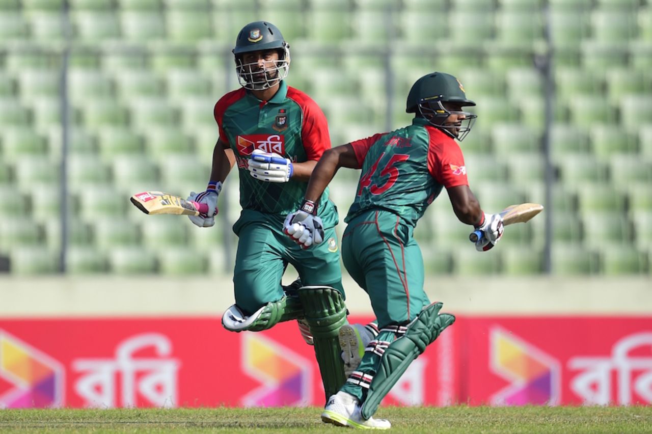 Imrul Kayes and Tamim Iqbal complete a run during their 147-run opening stand , Bangladesh v Zimbabwe, 3rd ODI, Mirpur, November 11, 2015