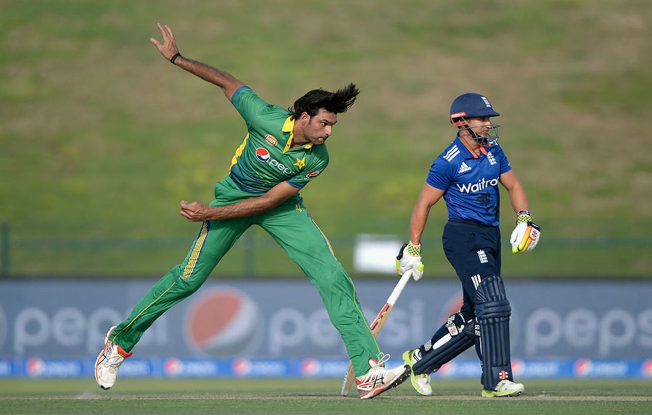 Even in his follow-through, Mohammad Irfan towers over the non-striker, James Taylor, Pakistan v England, 1st ODI, Abu Dhabi, November 11, 2015