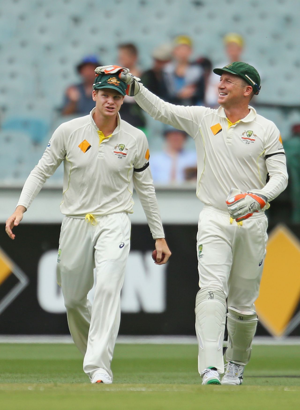 Brad Haddin pats Steven Smith on the head after Smith took a catch to dismiss Mohammed Shami, Australia v India, 3rd Test, Melbourne, day four, December 29, 2014