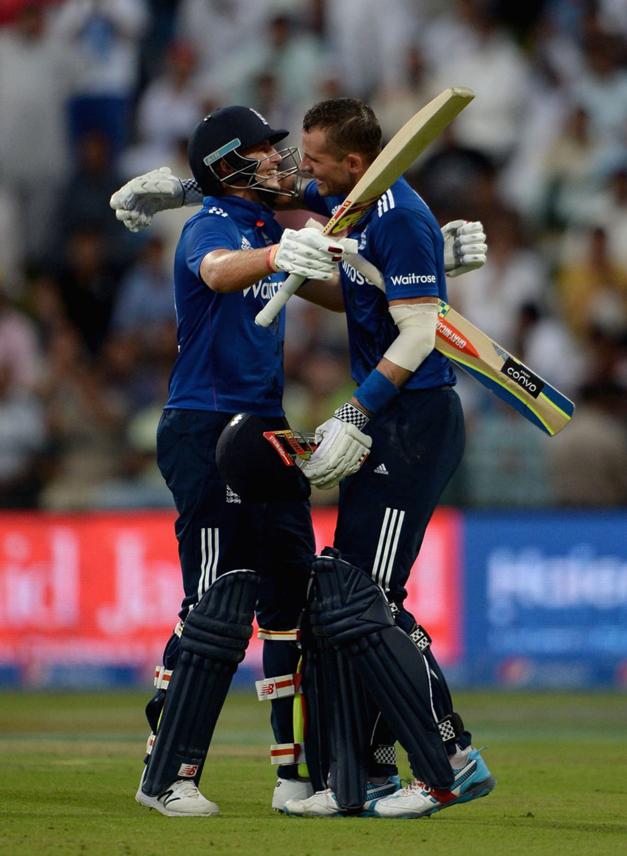 Alex Hales celebrates with Joe Root after his maiden ODI hundred, Pakistan v England, 2nd ODI, Abu Dhabi, November 13, 2015