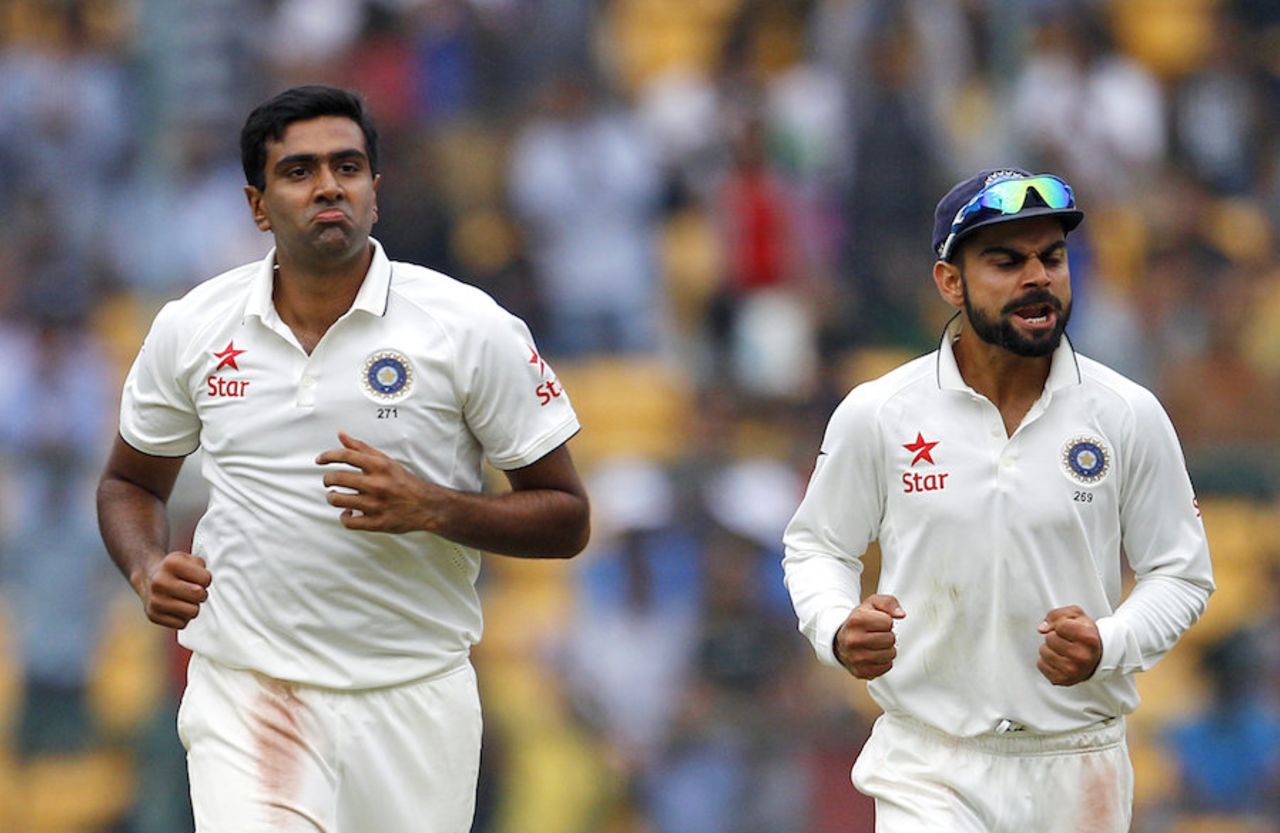 R Ashwin and Virat Kohli celebrate a wicket, India v South Africa, 2nd Test, 1st day, Bangalore, November 14, 2015