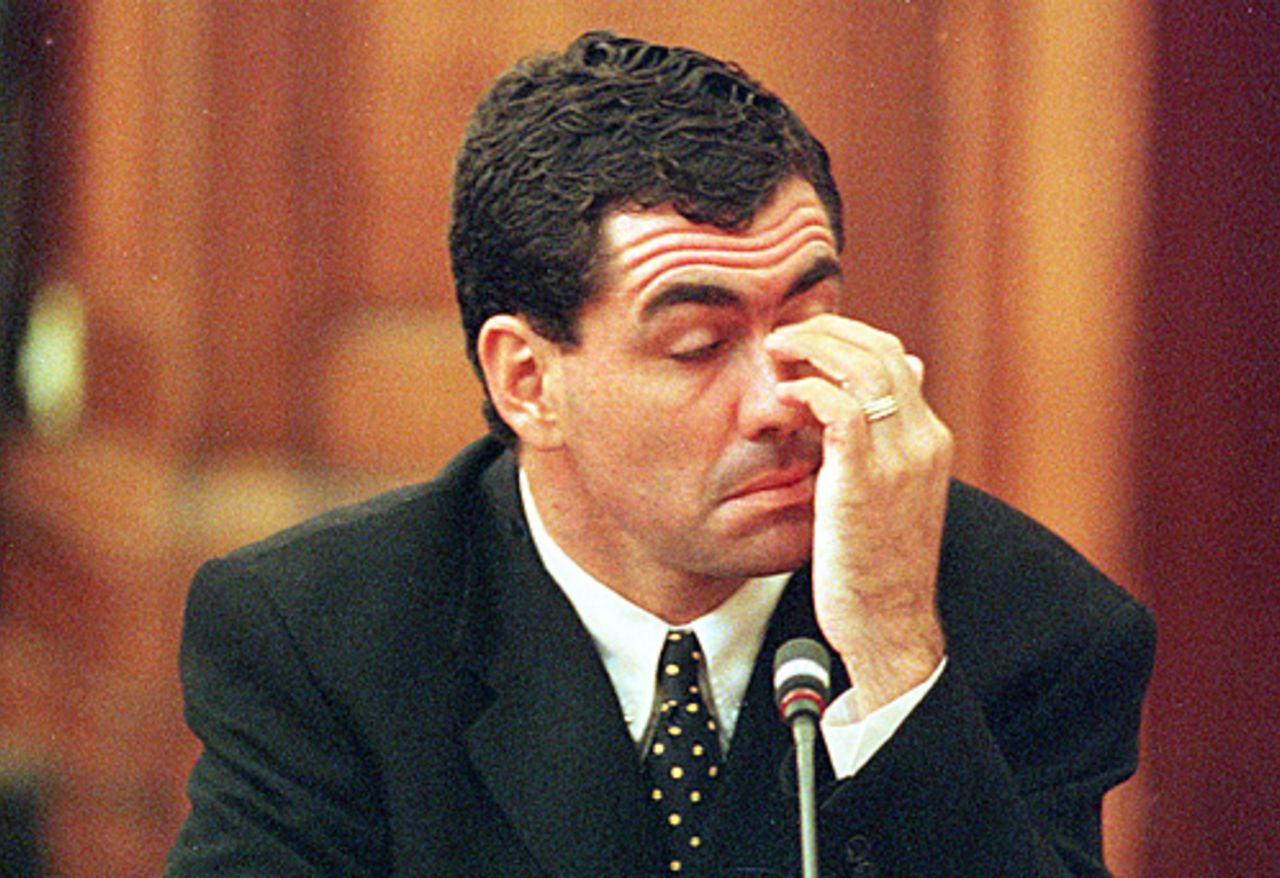 Former South African cricket captain Hansie Cronje appears to tire during his cross-examination at the King Commission of Inquiry into allegations of cricket match-fixing in Cape Town 22 June 2000.