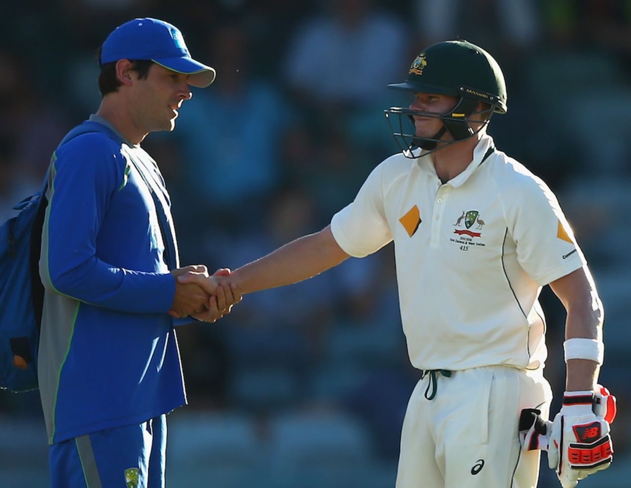 Steven Smith is tended to by the physio after he struck was struck on the elbow, Australia v New Zealand, 2nd Test, Perth, 4th day, November 16, 2015