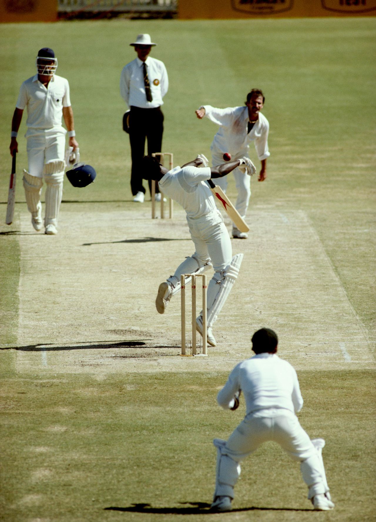 Norman Cowans loses his helmet while trying to avoid a bouncer from Dennis Lillee, Australia v England, 1st Test, Perth, 2nd day, November 13, 1982
