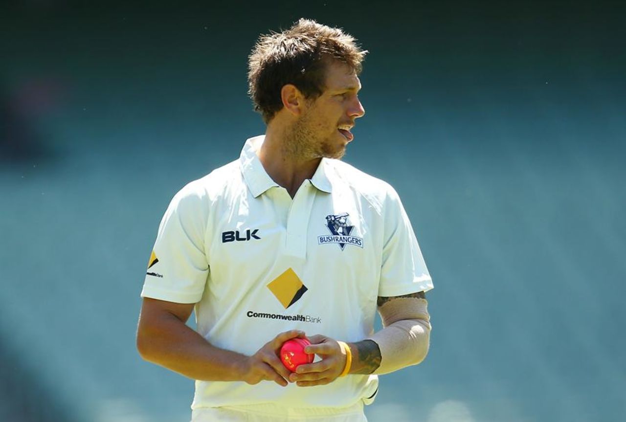 James Pattinson walks back to his mark with the pink ball, Victoria v Queensland, Sheffield Shield, Melbourne, 1st day, October 29, 2015
