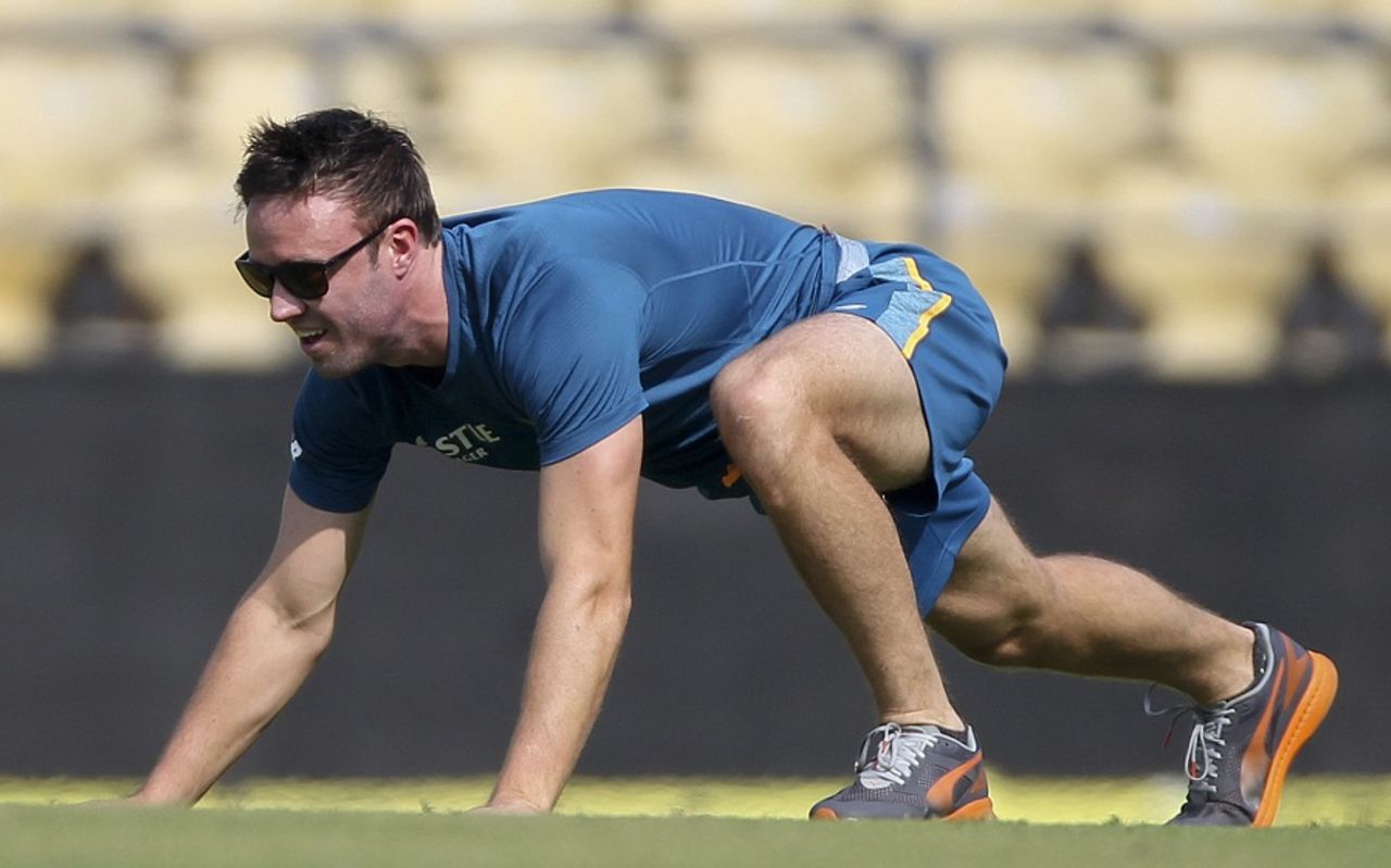 Get set and go: AB de Villiers warms up ahead of the third Test, Nagpur, November 24, 2015