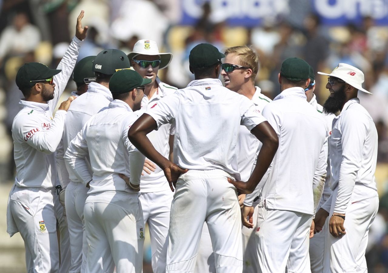 Simon Harmer is mobbed by his team-mates, India v South Africa, 3rd Test, Nagpur, 1st day, November 25, 2015