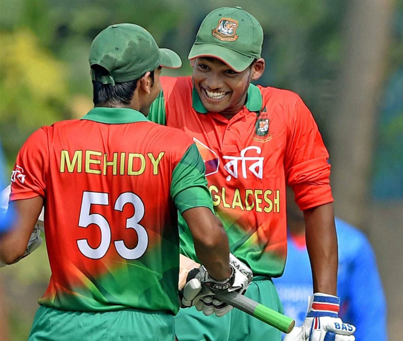 Bangladesh Under-19s captain Mehedi Hasan and Nazmul Hossain Shanto celebrate the team's win, Afghanistan Under-19s v Bangladesh Under-19s, Tri-Nation Under-19s Tournament, Kolkata, November 25, 2015