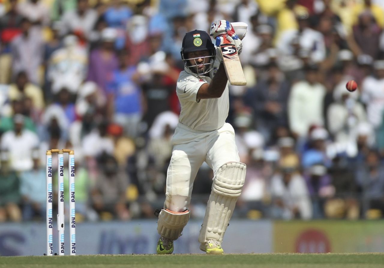 Cheteshwar Pujara drives through the off side, India v South Africa, 3rd Test, Nagpur, 2nd day, November 26, 2015