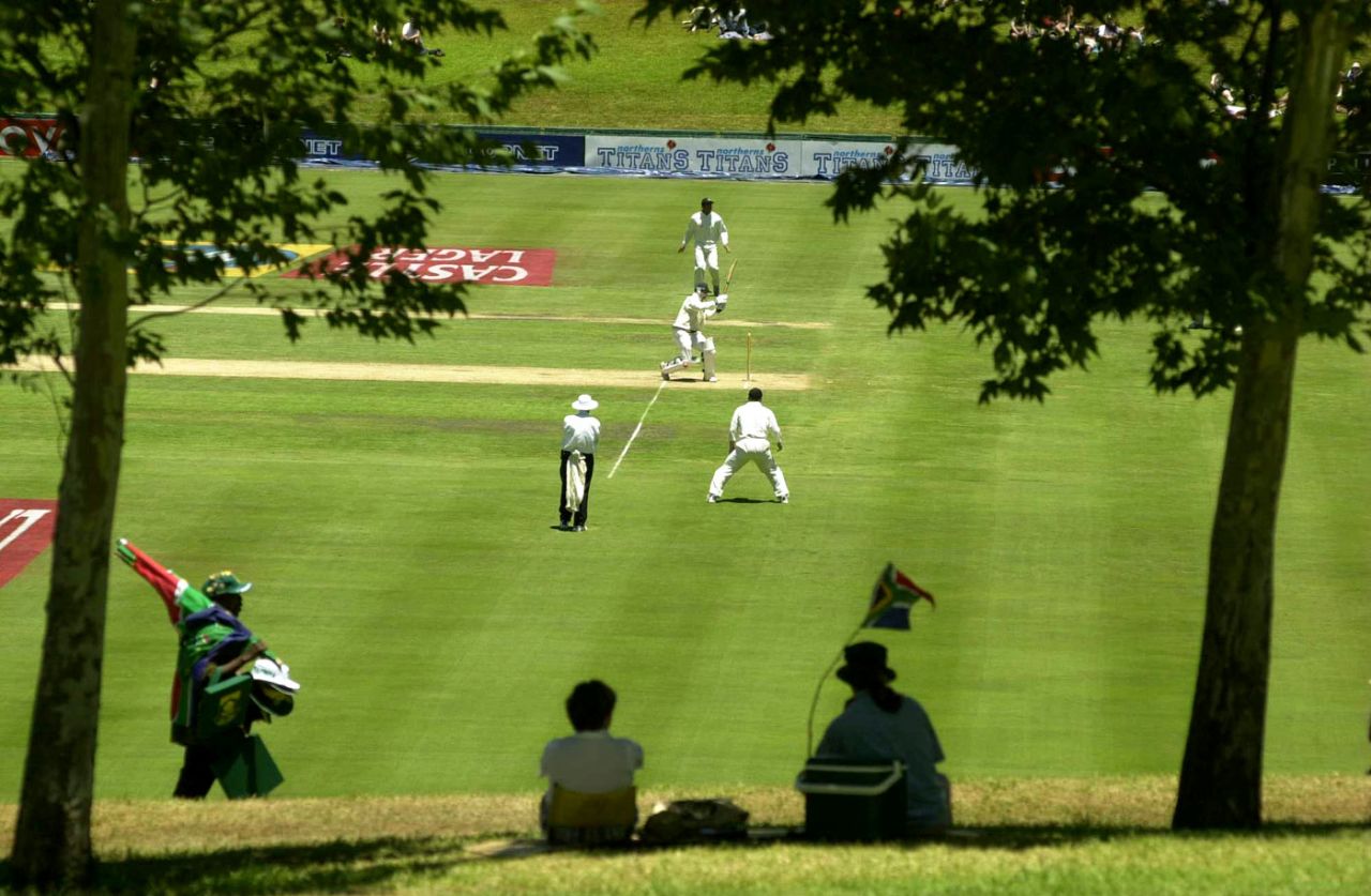 Spectators watch the Test from a shaded grass bank, South Africa v England, 5th Test, Centurion, 5th day, January 18, 2000