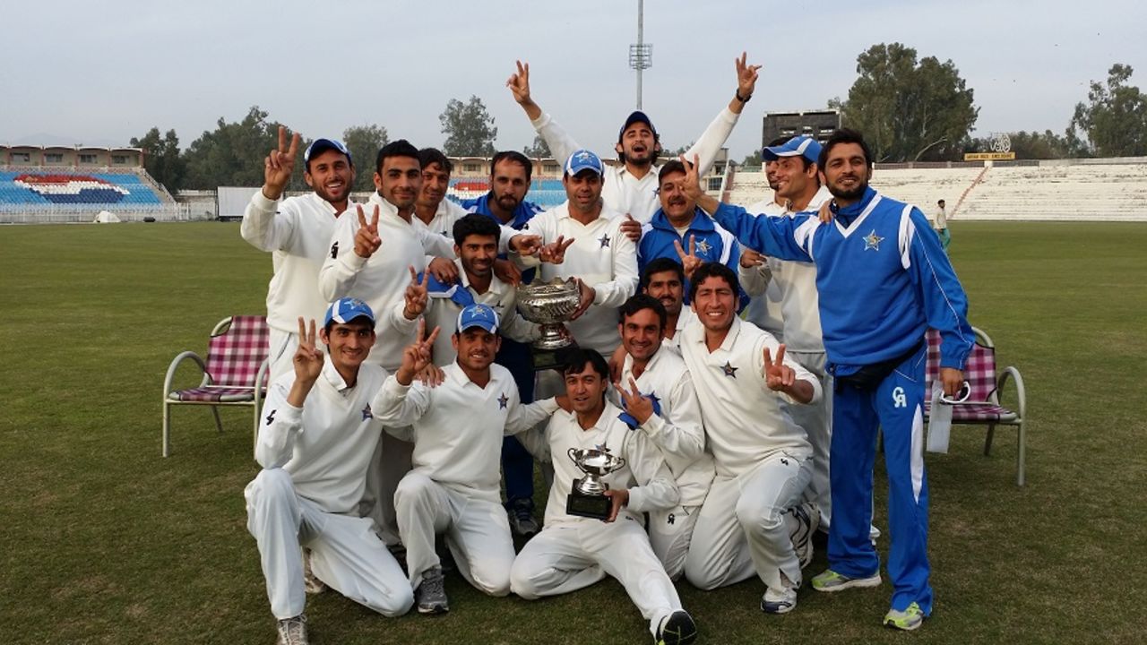 FATA players pose with a trophy, October 8, 2015