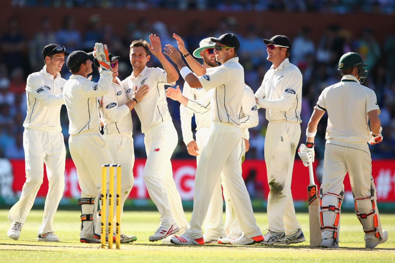 Trent Boult is mobbed after trapping Steven Smith lbw, Australia v New Zealand, 3rd Test, Adelaide, 3rd day, November 29, 2015