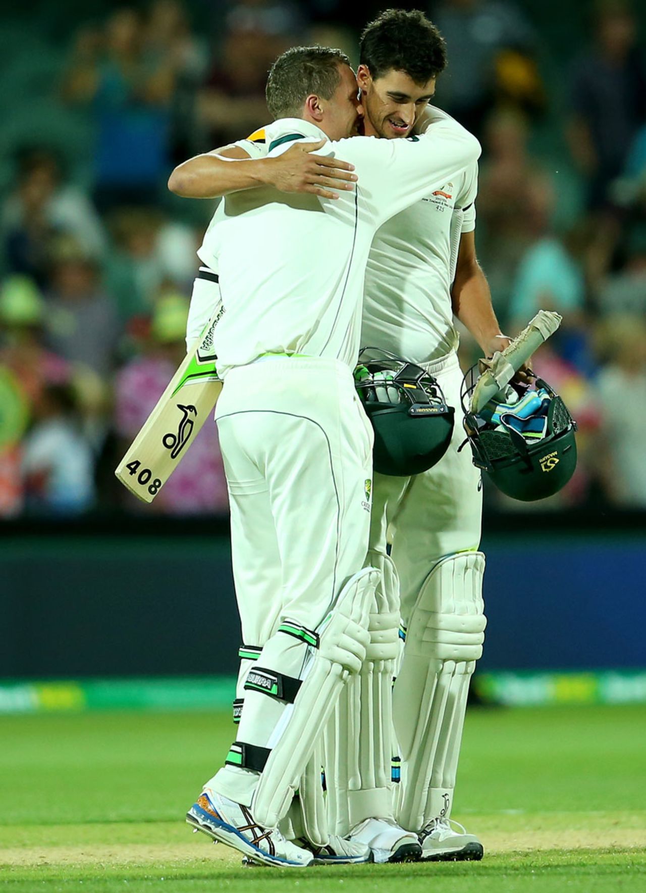 Peter Siddle and Mitchell Starc embrace after a tense finish, Australia v New Zealand, 3rd Test, Adelaide, 3rd day, November 29, 2015