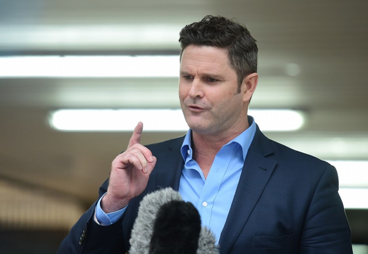 Chris Cairns speaks to reporters after the end of a nine-week trial in court, November 30, 2015