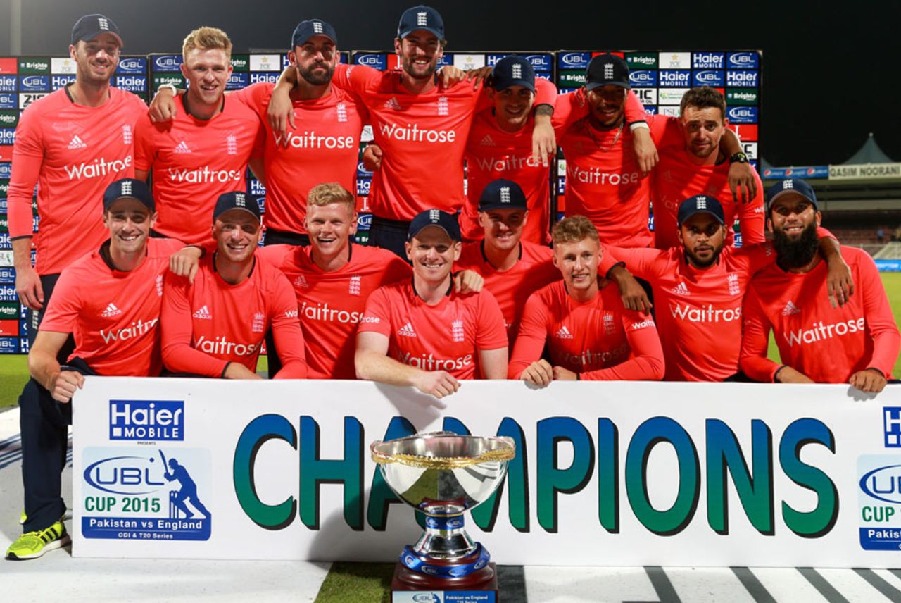 The beaming England players pose with the trophy, Pakistan v England, 3rd T20, Sharjah, November 30, 2015