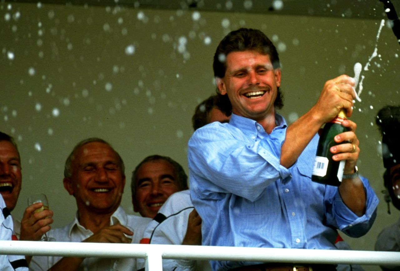 Robin Smith pops open the champagne after England's victory, England v West Indies, 5th Test, The Oval, 5th day, August 12, 1991