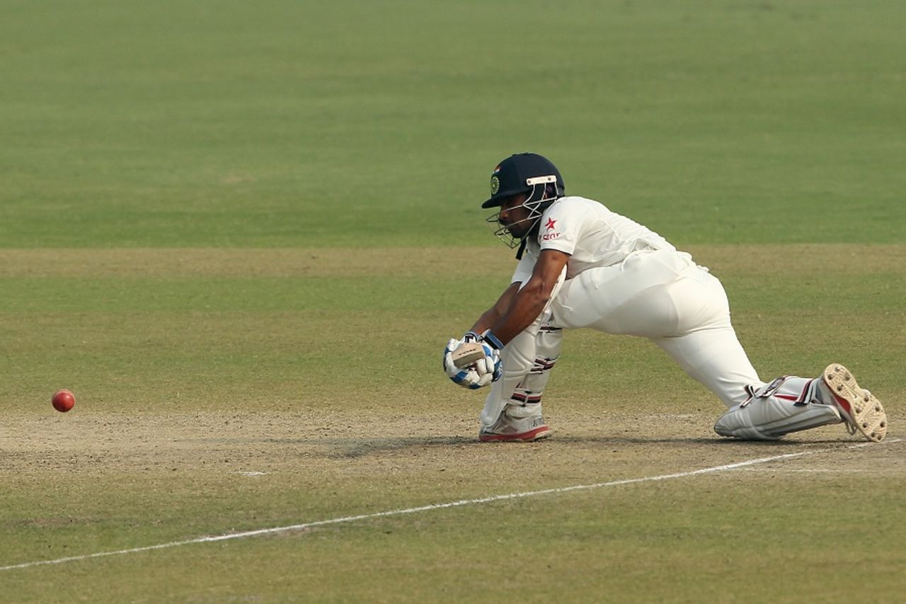 Wriddhiman Saha goes low for a sweep, India v South Africa, 4th Test, Delhi, 4th day, December 6, 2015
